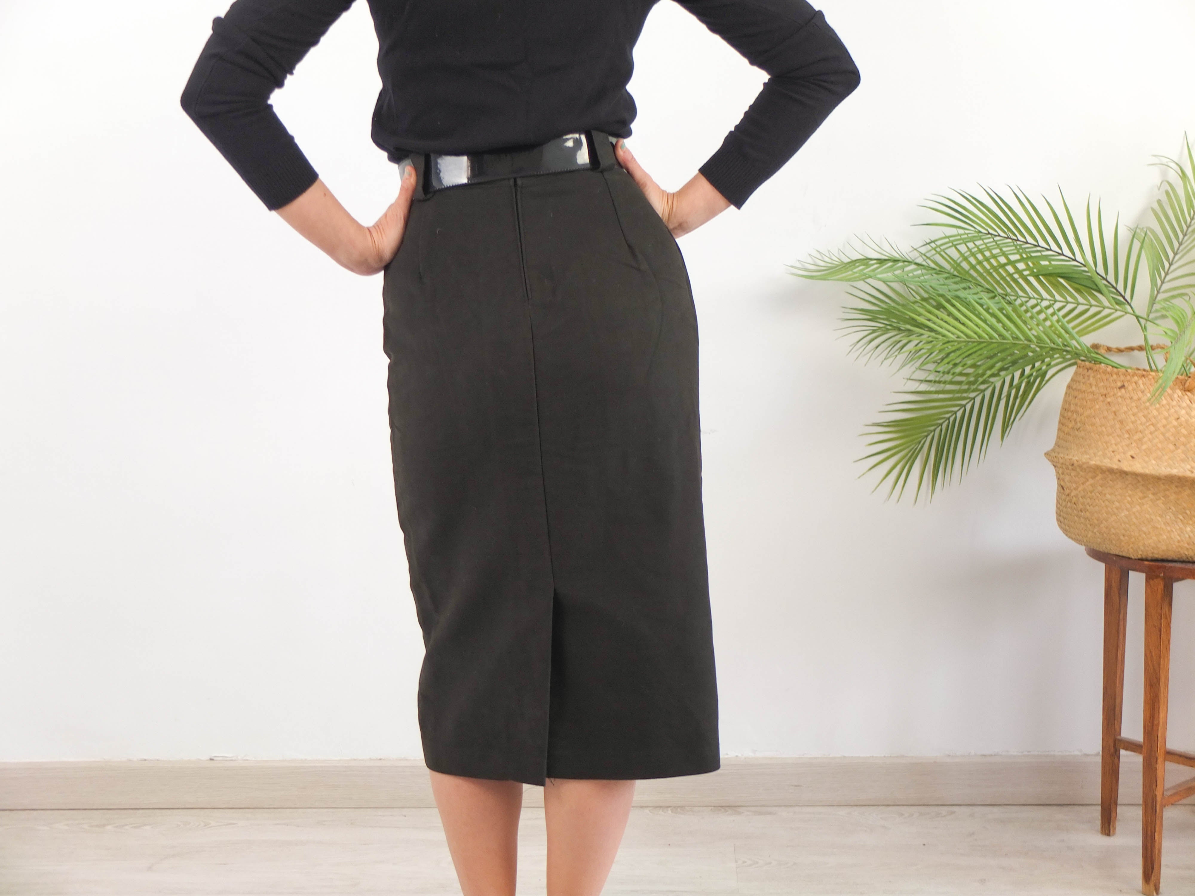 Falda midi negra de tubo con cinturon vintage 80s